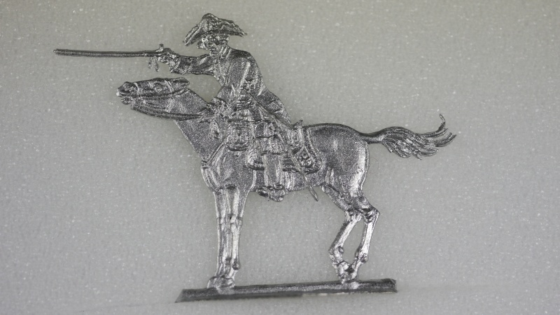 Friedrich der Große zu Pferd, mit Stock zeigend