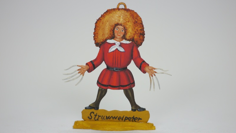 Struwwelpeter, beidseitig graviert, Höhe ca. 60mm