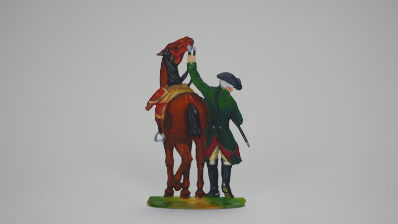 Pferdehalter/Reitknecht mit dem Pferd von Graf von Schwerin